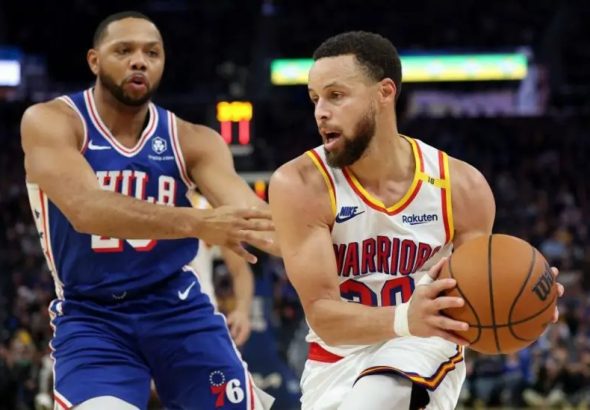 Curry makes history Warriors 76ers